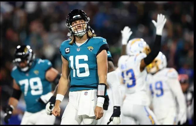 Jaguars quarterback Trevor Lawrence throws four picks in the first half in his postseason debut.