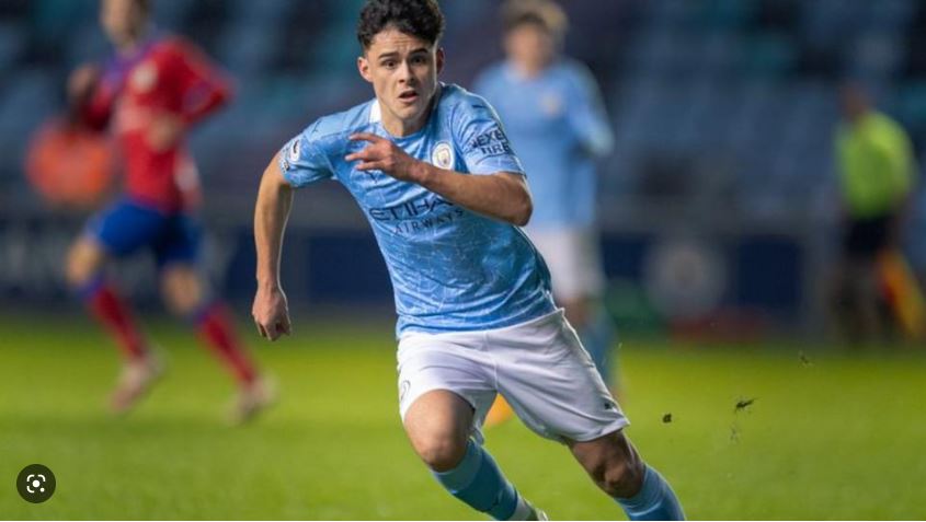 Graham Arnold focuses his attention on the next soccer star as a 17-year-old talent from Manchester City is called up.