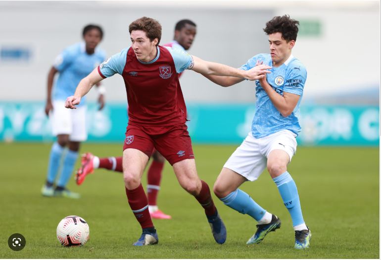 Graham Arnold focuses his attention on the next soccer star as a 17-year-old talent from Manchester City is called up.